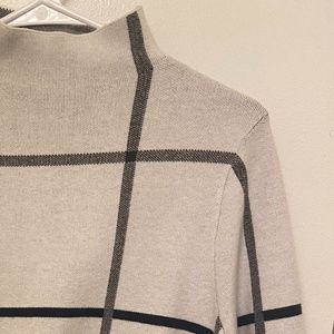 White half turtleneck sweater with stripes